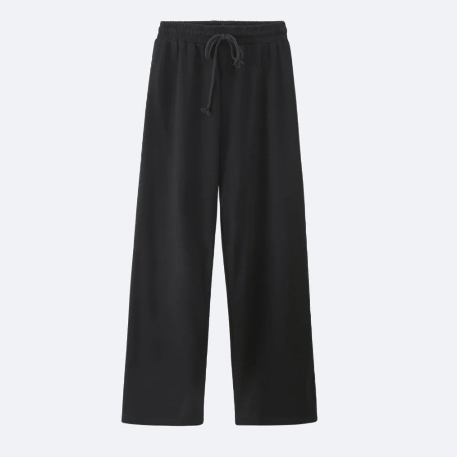 Pantalon Large Noir – Sobriété et Élégance Décontractée