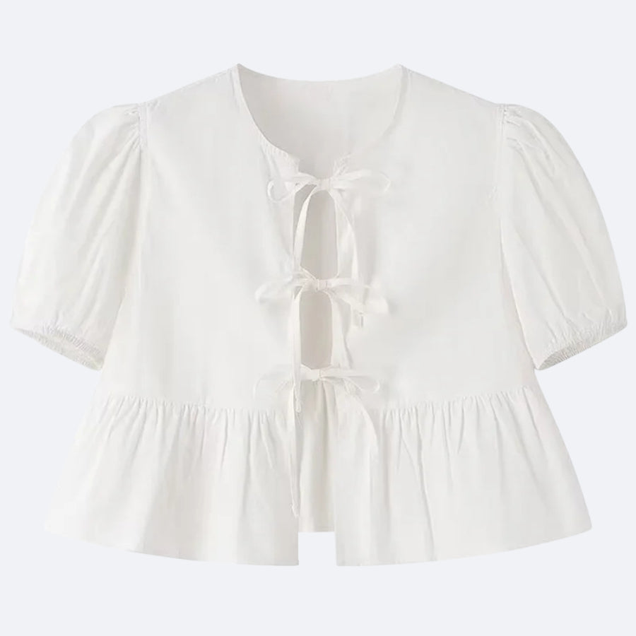 Blouse Blanche à Nœuds – Élégance & Fraîcheur