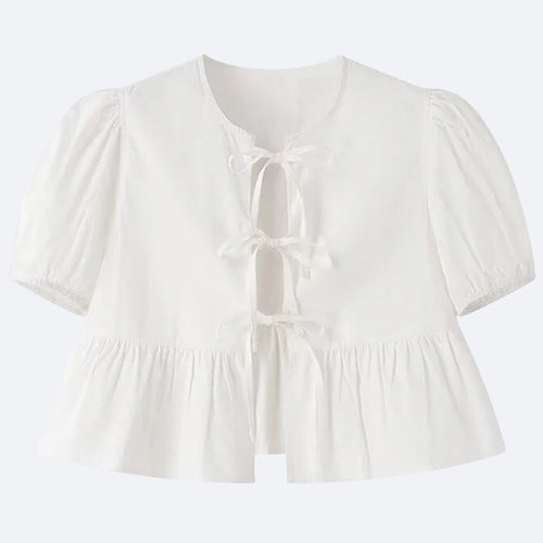 Blouse Blanche à Nœuds – Élégance & Fraîcheur