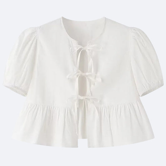 Blouse Blanche à Nœuds – Élégance & Fraîcheur